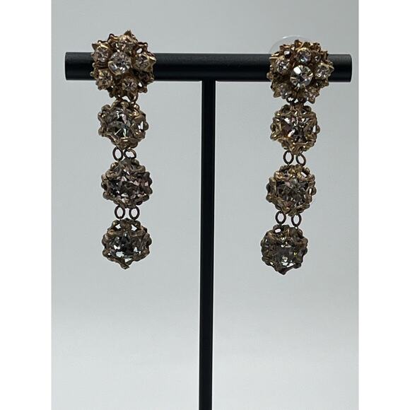 Vintage Gold-Tone Filigree Drop Rhinestone Accents
Statement Dangle Earrings - Picture 15 of 15